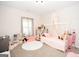 Cozy bedroom provides natural light and a spacious layout for a comfortable living space at 296 Beavers Rd, Grantville, GA 30220