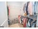 A walk-in closet with built-in shelving and storage at 296 Beavers Rd, Grantville, GA 30220