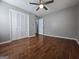 Bedroom with hardwood floors, closet and doorway for ample access at 5447 Ahyoka Dr, Morrow, GA 30260