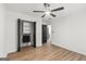 Bedroom with closet, ceiling fan, updated floors and doors to the en suite bathroom at 125 Marilyn Ct, Fayetteville, GA 30214