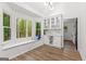 Cozy breakfast nook with a window seat, custom cabinetry, and a picturesque view at 125 Marilyn Ct, Fayetteville, GA 30214