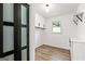 Functional mud room with storage cabinets, shelving, and access to the backyard at 125 Marilyn Ct, Fayetteville, GA 30214