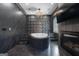 Stunning bathroom features a soaking tub, geometric tile wall, and fireplace creating a spa-like retreat at 4100 Oak Hill Rd, Douglasville, GA 30135