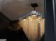 Close-up of a stylish modern chandelier with a waterfall chain design and recessed lighting at 4100 Oak Hill Rd, Douglasville, GA 30135