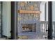 Stone fireplace with a wooden mantel, adding warmth and character to the room at 4100 Oak Hill Rd, Douglasville, GA 30135