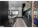 Contemporary kitchen featuring marble countertops, black cabinets, and stainless steel appliances with pendant lights at 4100 Oak Hill Rd, Douglasville, GA 30135