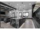 Spacious kitchen with marble countertops, modern appliances, sleek black cabinetry and a large island at 4100 Oak Hill Rd, Douglasville, GA 30135
