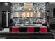 Gourmet kitchen features a marble backsplash, gold accents, and seating at the island, blending luxury with functionality at 4100 Oak Hill Rd, Douglasville, GA 30135