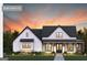 Charming single-story farmhouse with a welcoming front porch, beautiful windows, and professionally landscaped yard at 3841 Maggie Se Ct, Conyers, GA 30013