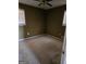 Bedroom with a ceiling fan, wall to wall carpeting, and natural light at 216 E Richardson St, Oxford, GA 30054