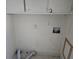Laundry room featuring washer dryer hookups and tile flooring at 216 E Richardson St, Oxford, GA 30054