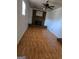 Living room with fireplace, neutral color palette and hardwood floors at 216 E Richardson St, Oxford, GA 30054