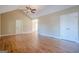 Spacious living room featuring vaulted ceilings, hardwood floors, and multiple doorways at 6365 Mountain View Trl, Cumming, GA 30041