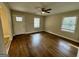 Bright living room with hardwood floors and natural light at 9184 Thrash Sw St, Covington, GA 30014