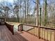 A wood deck that provides a serene view of the wooded backyard at 2232 Ramblewood Ne Cir, Decatur, GA 30035