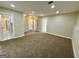 Finished basement area with carpet flooring, open space and multiple entrances at 2232 Ramblewood Ne Cir, Decatur, GA 30035