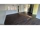 Open concept living room with hardwood floors, natural light and stairs at 3789 Conley Downs Ln, Decatur, GA 30034