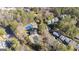 Aerial view of community amenities including a pool, tennis court, and residential buildings at 3099 Balearic Se Dr, Marietta, GA 30067