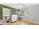 Bedroom featuring hardwood floors, neutral walls and a vanity table at 3099 Balearic Se Dr, Marietta, GA 30067