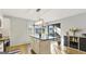 Well-lit kitchen featuring a central island with storage and access to a deck at 3099 Balearic Se Dr, Marietta, GA 30067