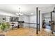 Bright open area with wood floors, a staircase, and a view to other rooms at 3099 Balearic Se Dr, Marietta, GA 30067