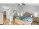 Bright main bedroom with hardwood floors, vaulted ceiling, and mirrored closet at 3099 Balearic Se Dr, Marietta, GA 30067