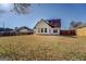 Spacious backyard features a privacy fence and view of the home's rear exterior at 6380 Winston Trce, Mcdonough, GA 30252