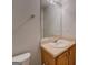 Bathroom featuring a vanity with drawers and a mirror at 6380 Winston Trce, Mcdonough, GA 30252