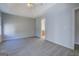 Spacious bedroom offering neutral carpeting, a ceiling fan, and an en-suite bathroom for convenience at 6380 Winston Trce, Mcdonough, GA 30252