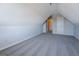 Spacious bonus room featuring carpet and access to multiple rooms at 6380 Winston Trce, Mcdonough, GA 30252