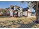 Charming home with dormer windows, brick accents, and attached two-car garage at 6380 Winston Trce, Mcdonough, GA 30252