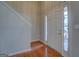 Foyer featuring wood floors at 6380 Winston Trce, Mcdonough, GA 30252