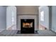 Living room featuring fireplace at 6380 Winston Trce, Mcdonough, GA 30252