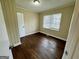 Bedroom featuring hardwood floors and a bright window at 2194 Loring Ct, Decatur, GA 30032