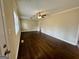 Bright living room featuring hardwood floors, ceiling fan, and natural light at 2194 Loring Ct, Decatur, GA 30032