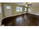 Living room with hardwood floors, ceiling fan, a front door, and ample light at 2194 Loring Ct, Decatur, GA 30032