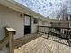 Exterior shot of back deck with wooden railings and access to the yard at 1145 Penn Se Ct, Atlanta, GA 30315