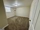 Cozy bedroom with neutral walls, carpet flooring and a window with natural light at 1145 Penn Se Ct, Atlanta, GA 30315