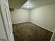 Bedroom with neutral walls, plush carpet and overhead lighting at 1145 Penn Se Ct, Atlanta, GA 30315