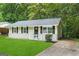 Charming single-story home with a well-maintained lawn and traditional curb appeal at 1145 Penn Se Ct, Atlanta, GA 30315