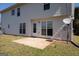 Backyard with patio showcasing a well-maintained exterior with ample natural light through multiple windows at 5120 Redcoat Ln, Mcdonough, GA 30252