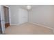 Bedroom features neutral colors, carpeted flooring, and a closet at 5120 Redcoat Ln, Mcdonough, GA 30252
