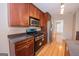 Updated kitchen with stainless steel appliances, a gas range, and ample cabinet space at 5120 Redcoat Ln, Mcdonough, GA 30252