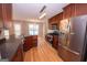 Bright kitchen features granite countertops, stainless appliances, and an adjacent dining area at 5120 Redcoat Ln, Mcdonough, GA 30252