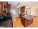 Well-lit kitchen with stainless steel appliances, granite counters, and a center island at 5120 Redcoat Ln, Mcdonough, GA 30252