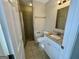 Bathroom featuring tiled shower, granite vanity, and tile floors at 5319 Orly Ter, South Fulton, GA 30349