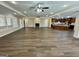 Spacious living room featuring hardwood floors, a fireplace, and open floor plan at 5319 Orly Ter, South Fulton, GA 30349