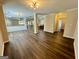 Spacious open-concept living area with hardwood floors and recessed lighting at 5319 Orly Ter, South Fulton, GA 30349