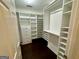 Organized walk-in closet with custom shelving and storage solutions at 5319 Orly Ter, South Fulton, GA 30349