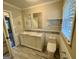 Bright bathroom with double sink vanity, updated fixtures, and natural light, blending style and functionality at 230 Argus Cir, Atlanta, GA 30331